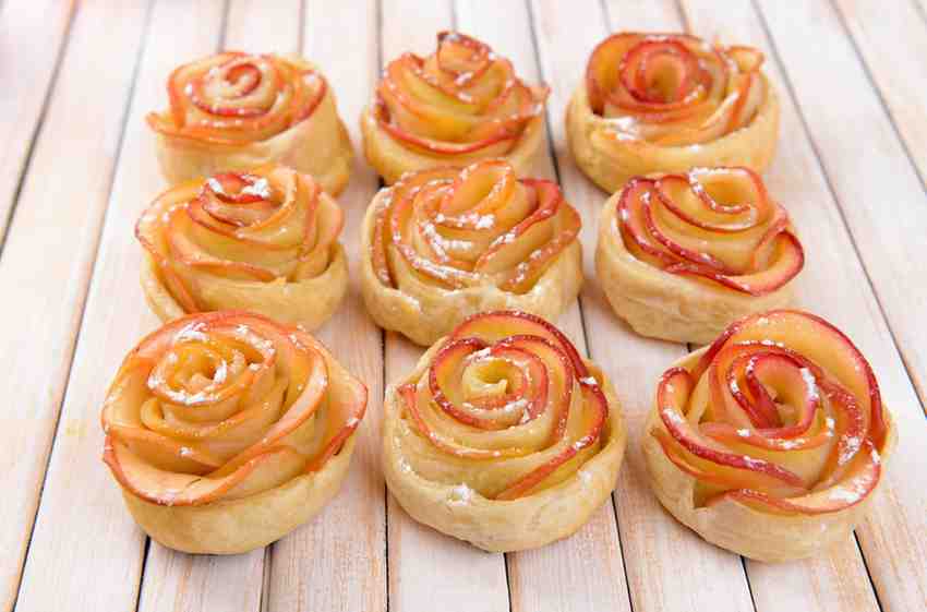 tasty-puff-pastry-with-apple-shaped-roses-table-closeup